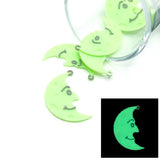 Smiling crescent moon glow-in-the-dark charm measuring 27x31mm