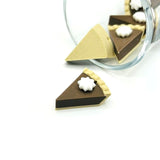 3D chocolate pie charm with detailed crust, chocolate filling, and whipped topping, displayed on a white background.