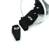 3D black coffin charm with silver cross detail on the lid, shown on a white background.