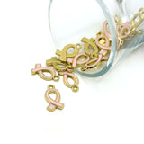 A set of pink ribbon-shaped charms with enamel fill and small loop tops, symbolizing breast cancer awareness, displayed on a white background