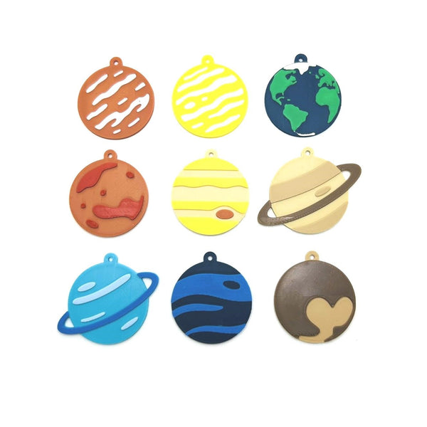 Set of colorful planet-shaped items on a white background