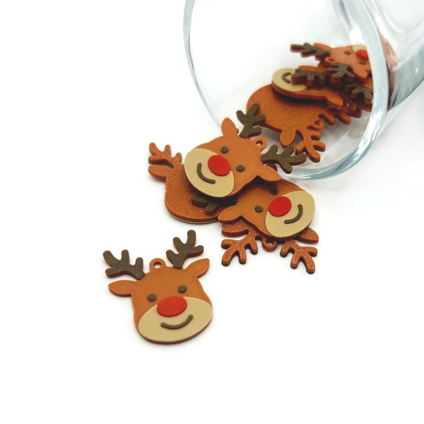 Reindeer charm with red nose and antler details, about 21×25 mm, shown against a white background.