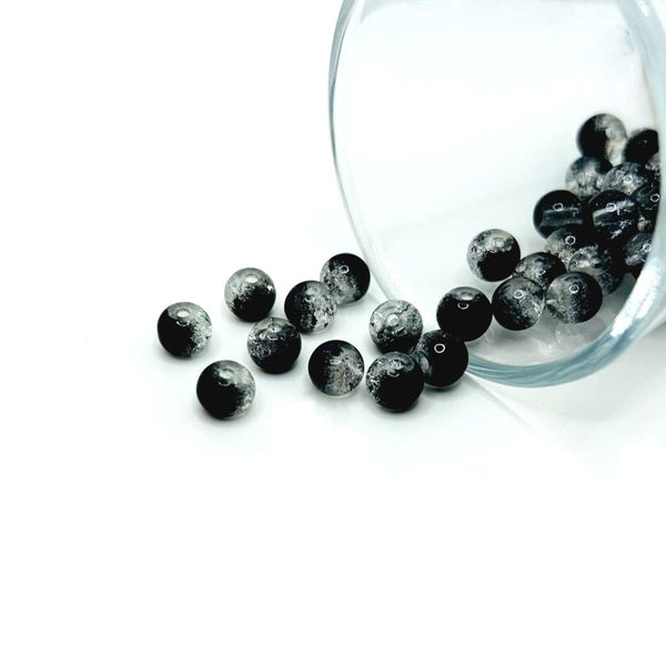 Round 6 mm black and clear crackle glass beads in a mixed pack, showing the distinctive internal crackle texture and glossy finish, displayed on a white background.