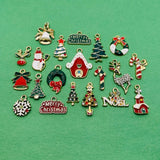 Collection of Christmas-themed charms on a green background