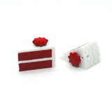 red velvet cake charms on a white background
