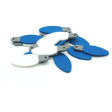 Set of blue and white christmas light charms on a white background