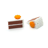 carrot cake charms on a white background