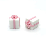 pink and white present charm