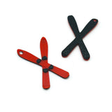 Red ski charms on a white background