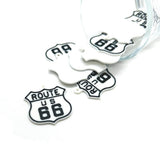 route 66 charm on a white background
