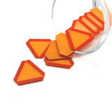Orange and red slow vehicle signs on a white background
