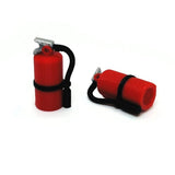 Two red fire extinguisher charms with black hoses on a white background