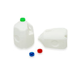 Two miniature milk jugs with colorful lids on a white background