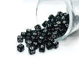 black beads with white emoji faces