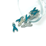 Teal and silver ribbon charms on a white background
