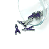 Purple and silver ribbon charms on a clear glass background
