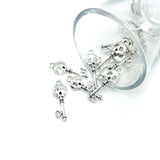 9x26mm antique silver skeleton face skeleton key charms for gothic jewelry making, Halloween crafts, necklaces, bracelets, and DIY projects.