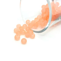 6mm peach frosted glass beads on a string, great for jewelry-making and craft projects.