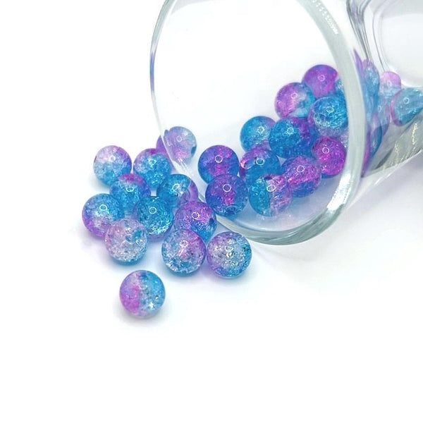 8.5mm pink and clear crackle glass beads on a string, sparkling with textured facets—perfect for jewelry-making and craft projects.