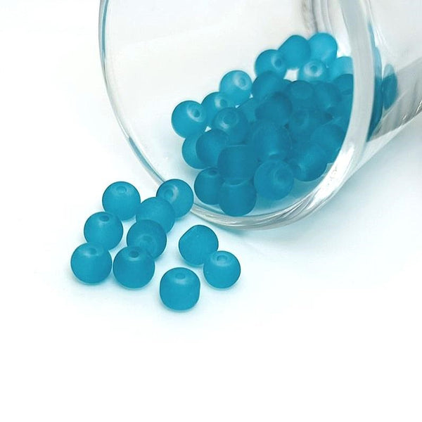 6mm light blue frosted glass beads on a string, great for jewelry and craft projects.