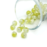 8.5mm yellow and clear crackle glass beads on a string, sparkling with cracked-texture facets—perfect for jewelry-making and craft projects.