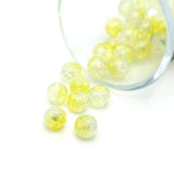 8.5 mm yellow and clear crackle glass beads on a string, sparkling with textured facets—perfect for jewelry-making and craft projects.
