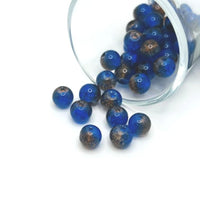 8 mm blue and brown crackle glass beads on a string, showcasing a textured crackle finish—ideal for jewelry-making and craft projects.