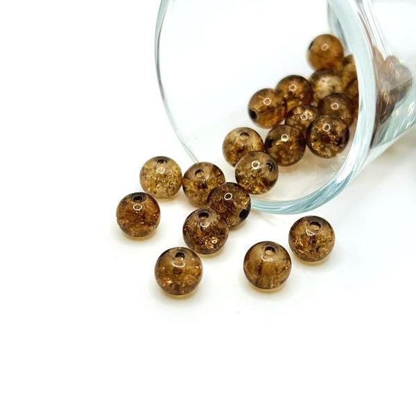8.5 mm brown and clear crackle glass beads on a string, showcasing a warm, cracked-glass texture—ideal for jewelry-making and craft projects.
