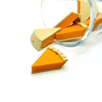 3D pumpkin pie charm with detailed orange filling, pie crust displayed on a white background.
