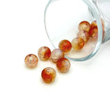 10mm orange and clear crackle glass beads – round crackled beads with vivid orange and clear glass detailing