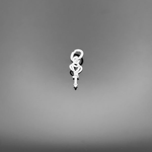 A small sterling silver key charm measuring approximately 14×5 mm, shown on a white background with visible fine detailing and a 3.5 mm attachment hole.