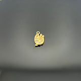 A shiny gold-tone miniature paint palette charm with brush detail, measuring approximately 14 × 8 mm, shown on a white background.
