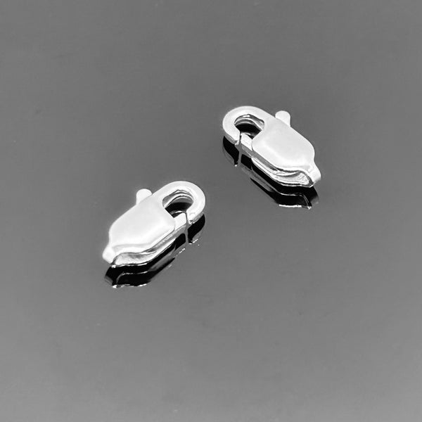 A sterling silver lobster clasp, approximately 10 × 5 mm, with polished finish, shown on a clean white background.