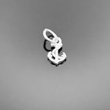 A sterling silver anchor-shaped charm with polished finish, approximately 9 × 5 mm, displayed on a clean white background.