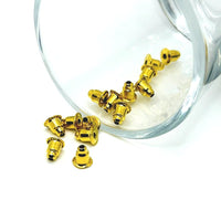 A set of gold-plated bullet-style earring backs (approx. 6×5 mm) with smooth, reflective surface and post hole insert, shown on a white background.