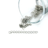 Antique silver-toned extender chain approximately 5 cm long, with oval links and lobster clasp, shown against a white background.
