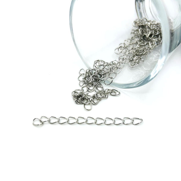 Antique silver-toned extender chain approximately 5 cm long, with oval links and lobster clasp, shown against a white background.
