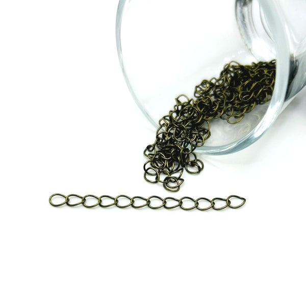 A bronze-toned extender chain approximately 5 cm long, featuring small oval links and a lobster clasp, displayed on a white background.