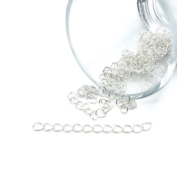 A 5 cm silver-toned extender chain made of plated iron, displaying oval links and a clasp on a white background