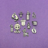 A collection of six distinct silver-toned baby-themed charms (approximately 200 pieces in total) arranged together.