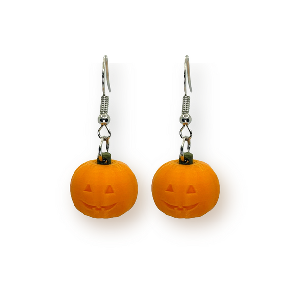 Pair of earrings featuring orange jack-o-lantern pumpkin charms accented with black bows, displayed against a white background.