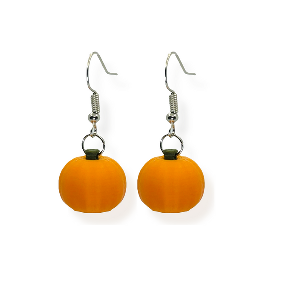 Pair of orange pumpkin dangle earrings with green stems and pumpkin details, displayed against a clean white background.